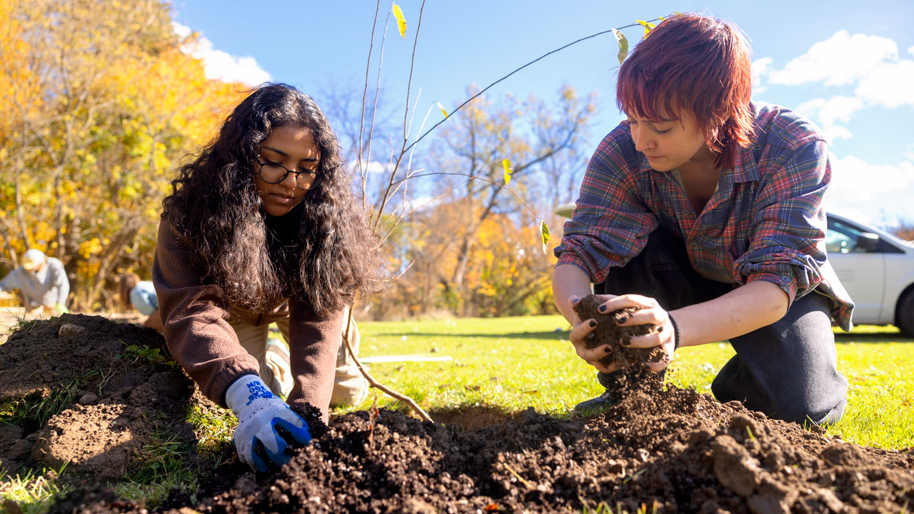 students working in ons medicinal garden 